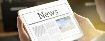 Tablet mit Zeitungsartikel